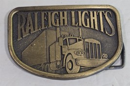 Vintage Raleigh Lights Trucker Antiqued Brass Metal Belt Buckle - $350.51 MXN