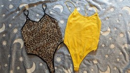 Set of 2 Forever 21 body suits, leopard print and Yellow. size Xs. New. ... - $14.85