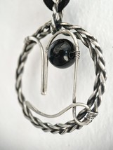 Wire wrapped Capricorn zodiac sign , sterling silver pendant with black onyx cry - $129.00