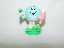 M Ms Pastel green Holding Watering Can Topper 2 1/2 Inches Tall 1995 - £3.91 GBP