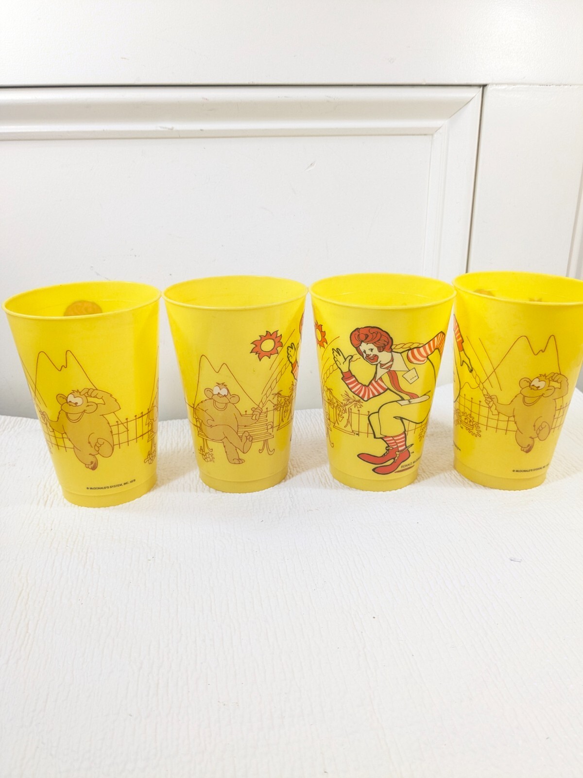 Vintage McDonald&#39;s x4 Ronald McDonald monkeys jump rope yellow plastic c... - $11.00