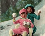 Vtg Postcard 1910 Christmas Children Riding Downhill on Sled Throwning S... - $18.76