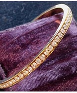 Glittering Vintage AVON Golden Rhinestone Bangle Bracelet - $35.00