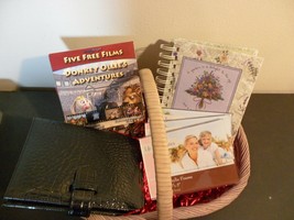 gift basket with 2-photo albums,3-frames,2-donkey ollie&#39;s adventures dvds - $17.33