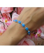 Sterling Silver Blue Lab Opal Bracelet: Adjustable Chain, 7" - $124.80