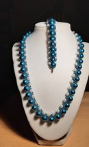 necklace is 20 in long when worn normally.  for a fun look you can twist it - $37.39