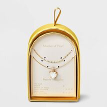 A New Day™ 14K Gold Dipped CZ Mother of Pearl Heart Pendant Necklace Gold - $211.98 MXN A New Day™ 14K Gold Dipped CZ Mother of Pearl Heart Pendant Necklace Gold - $211.98 MXN