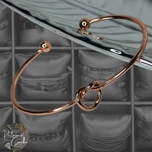 Womens Rose Gold Lightweight Alloy Twisted Heart Love Knot Slip On Cuff Bracelet - $15.00