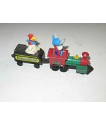 ERTL  FOUR PIECE LOONEY TUNES TRAIN SET PUSH TYPE- EXC- M44 - $168.06 MXN