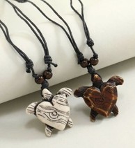 2 turtle necklaces on a brown rope chain - £9.01 GBP