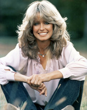 Farrah Fawcett beautiful 1970&#39;s pose seated outdoors in blue jeans 12x18  Poster - £15.72 GBP
