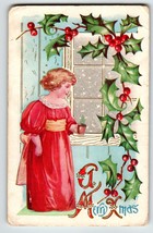Christmas Postcard Women By Window Holding Cup Vintage Embossed Poinsettias - £5.97 GBP