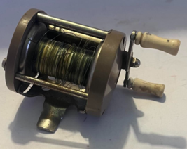 OCEAN CITY # 1581 BAIT CASTING FISHING REEL TAN WORKING CONDITION - $9.50