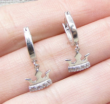 925 Sterling Silver - White Cubic Zirconia Royal Crown Huggie Earrings -... - $440.12 MXN