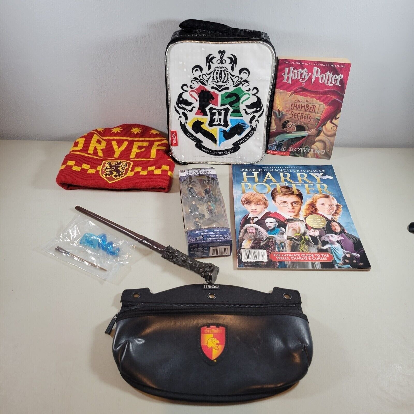 Harry Potter Lot Metal Figs, Mini Wand, Wand, Beanie, Book, Zipped Pencil Holder - $50.00