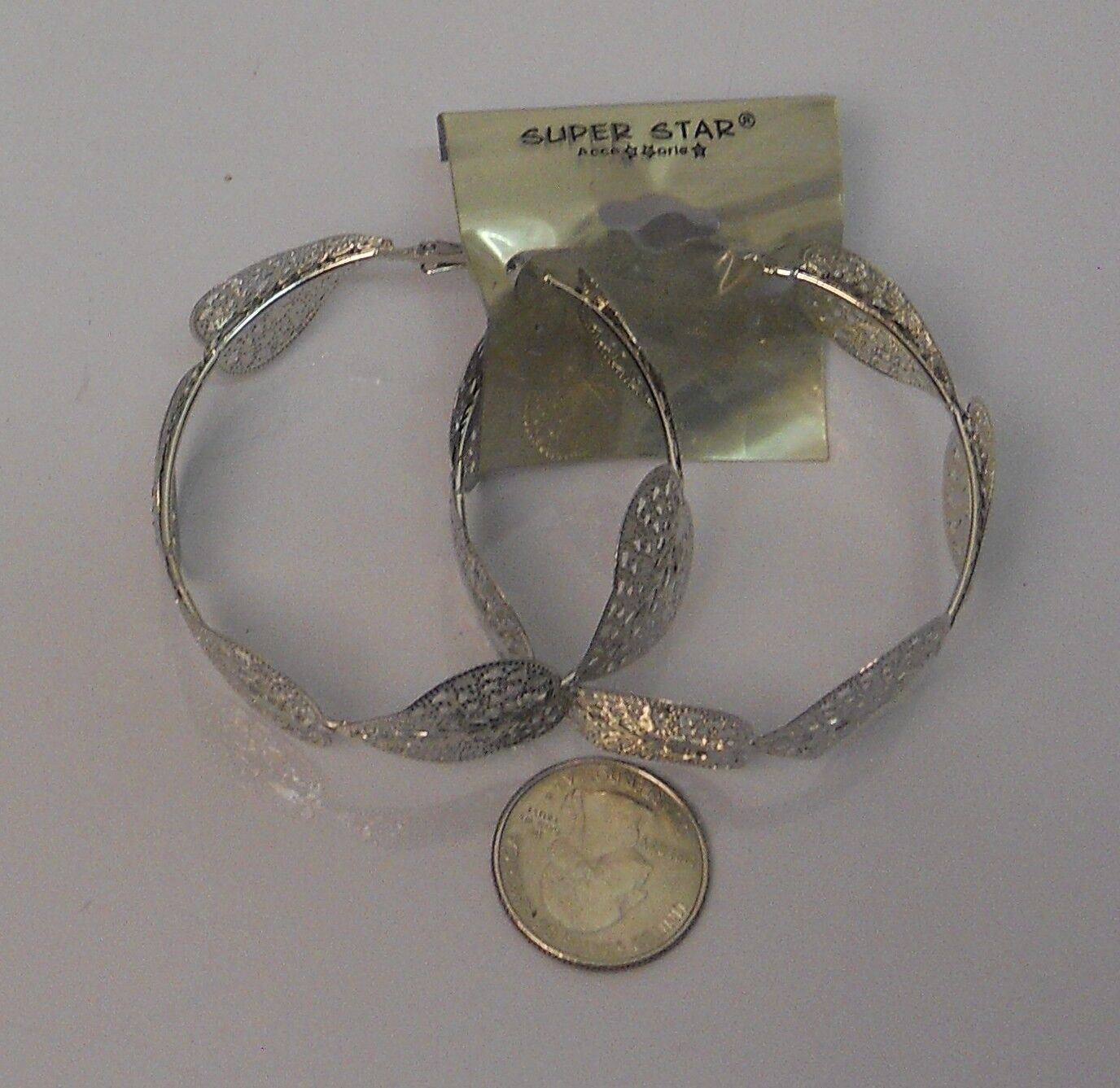 Super Star Jewelry Ladies Heart Hoop Earrings Silver Tones Leverback Fasteners - $6.00