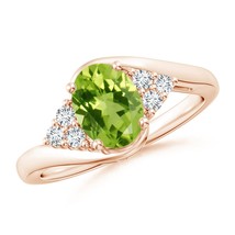 Authenticity Guarantee

ANGARA 1.52 Ct Oval Peridot Bypass Ring with Trio Dia... - £1,074.92 GBP