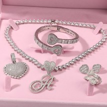 Necklace/Earrings/Ring/Bracelet Set Iced Out Cubic Zirconia Heart Series Accesso - £91.00 GBP
