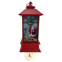 Lantern Swivel Plug In Night Light with Santa Placing Star on Tree 6 Inch - $27.70