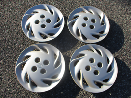 Genuine 1997 to 1999  Mercury Tracer 14 inch hubcaps wheel covers - $41.73