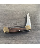 Buck Ebony Finger Groove 110 Folding Knife Gold Wood - $49.87