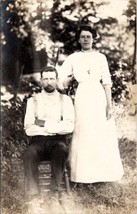 RPPC Poor Woman with Scary Man Seated in Yard c1910 Postcard B22 - £7.05 GBP