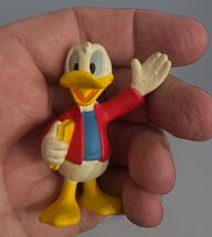 Vintage 1990's Disney Donald Duck Figure Toy Red Jacket with Book PVC - $5.69