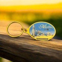 Vtg Keychain Nashville Tennessee Oval Gold METAL Music City USA Enamel  ... - $13.90