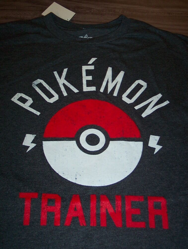 Primary image for NINTENDO POKEMON  TRAINER POKEBALL T-Shirt LARGE NEW w/ TAG