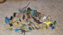Lot of 42 plastic dinosaurs and a bonus dragon. - £11.85 GBP