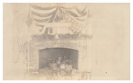 Old faded photo of a United States flag hanging above a fireplace RPPC Postcard - £8.66 GBP