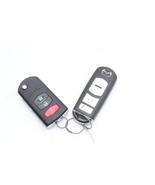 10-13 MAZDA 3 KEY FOB REMOTES PAIR E4757 - $2,275.96 MXN