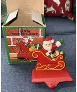 Vintage Red Christmas Cast Iron Stocking Holder Santa in Sleigh Original... - $14.84