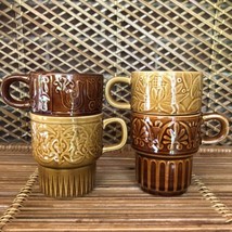 4 VTG Embossed Mid Century Modern Ceramic Glazed Stacking Mugs Japan Brown Gold - £20.30 GBP