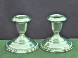 Empire Silver Weighted Candleholders 44 - $60.00
