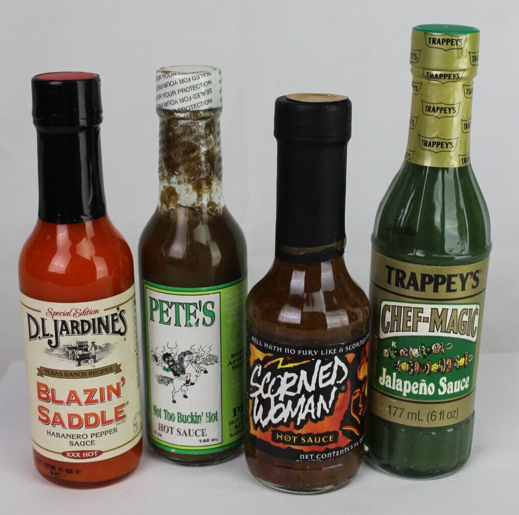 Primary image for RARE! x4 hot sauce GLASS COLLECTIBLE BOTTLE New Old Stock Scorned Woman Pete's