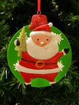 SANTA HOLDING CHRISTMAS TREE SPRING BACK W/ SNOWFLAKE DESIGN BALL XMAS O... - $9.88