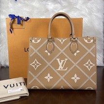 Authenticity Guarantee 
Louis Vuitton Arizona Stitched On The Go MM - $4,350.00