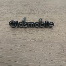 Vtg Gm Oldsmobile Oem Emblem 80&#39;s Badge Name Metal w/Pegs 4&quot; Wide - £19.77 GBP