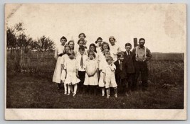 RPPC Ashton IL Children Family Funny Face No Smile Gathering c1910 Postcard Z28 - £7.15 GBP