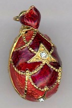 Russian Faux Pendant 2 Reds b/g w/golden rope designs, band and crystals - $462.74 MXN