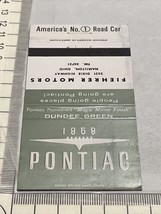 Vintage Matchbook Cover  1959 Pontiac  Dundee Green  Hamilton Ohio  gmg Unstruck - £9.73 GBP