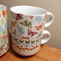 Pier One stackable Coffee Mugs, set of 4, butterfly paisley leaves geometric image 3