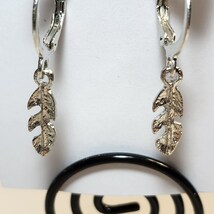 Feather Earrings - $2.00
