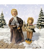 Christmas Carolers Figurines Grandma And Grandson Brown Holiday Display - $31.86 CAD