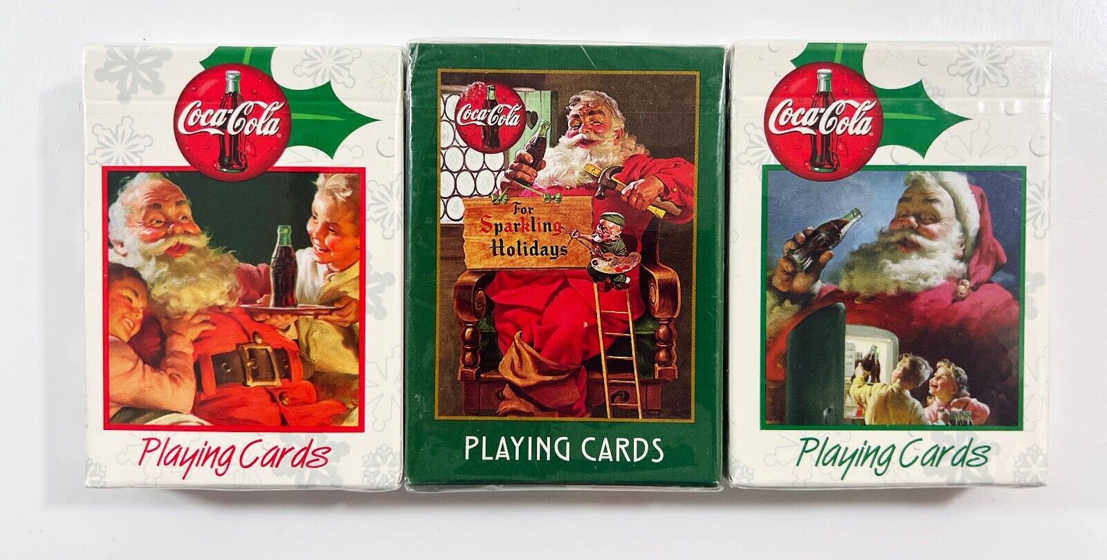 LOT OF 3 Coca Cola Christmas Playing Cards Santa Claus Plastic Coated Se... - $7.67