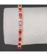 Avon 6.5” Red Ruby & Clear Colored Rhinestone Gold Tone Tennis Bracelet ... - €12,98 EUR Avon 6.5” Red Ruby & Clear Colored Rhinestone Gold Tone Tennis Bracelet ... - €12,98 EUR