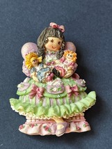Cute Black-Haired Little Girl in Green Frilly Dress Holding to Dolls Resin Pin - £7.50 GBP