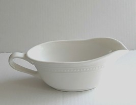 White Gravy Boat Ceramic Sleek Design Ribbin Design around the top. - $12.50