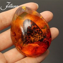 NEW! Beautiful Butterfly Simulated Amber Pendant - $15.00